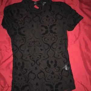 Black see through half suede bodysuit.